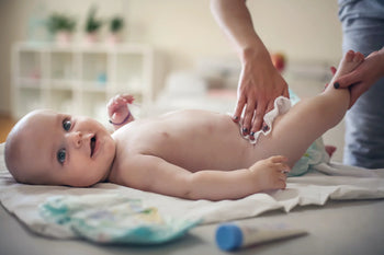 eau ou liniment pour changer bébé